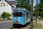 21.07.2016: DÛWAG GT6 ledvogn nr. 48 på den enkeltsporede strækning langs Dorfstraße. Skiftesporet fører ind til sporvejens remiseanlæg.
