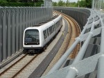 13.06.2008: I retning mod Lufthavnen passerer metroen kort før Kastrup Station under Saltværksvej.