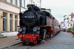 29.08.2014: Tog med lokomotiv nr. 99.2322-8 i spidsen ankommer fra Kühlingsborn til standsningsstedet Stadtmitte i Mollistraße.